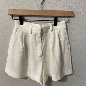 ARITZIA Babaton Pleated Mini High-Rise Crepe Shorts in Light Birch